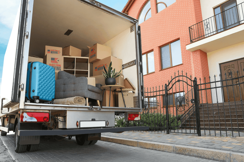 professional moving truck parked in front of a house