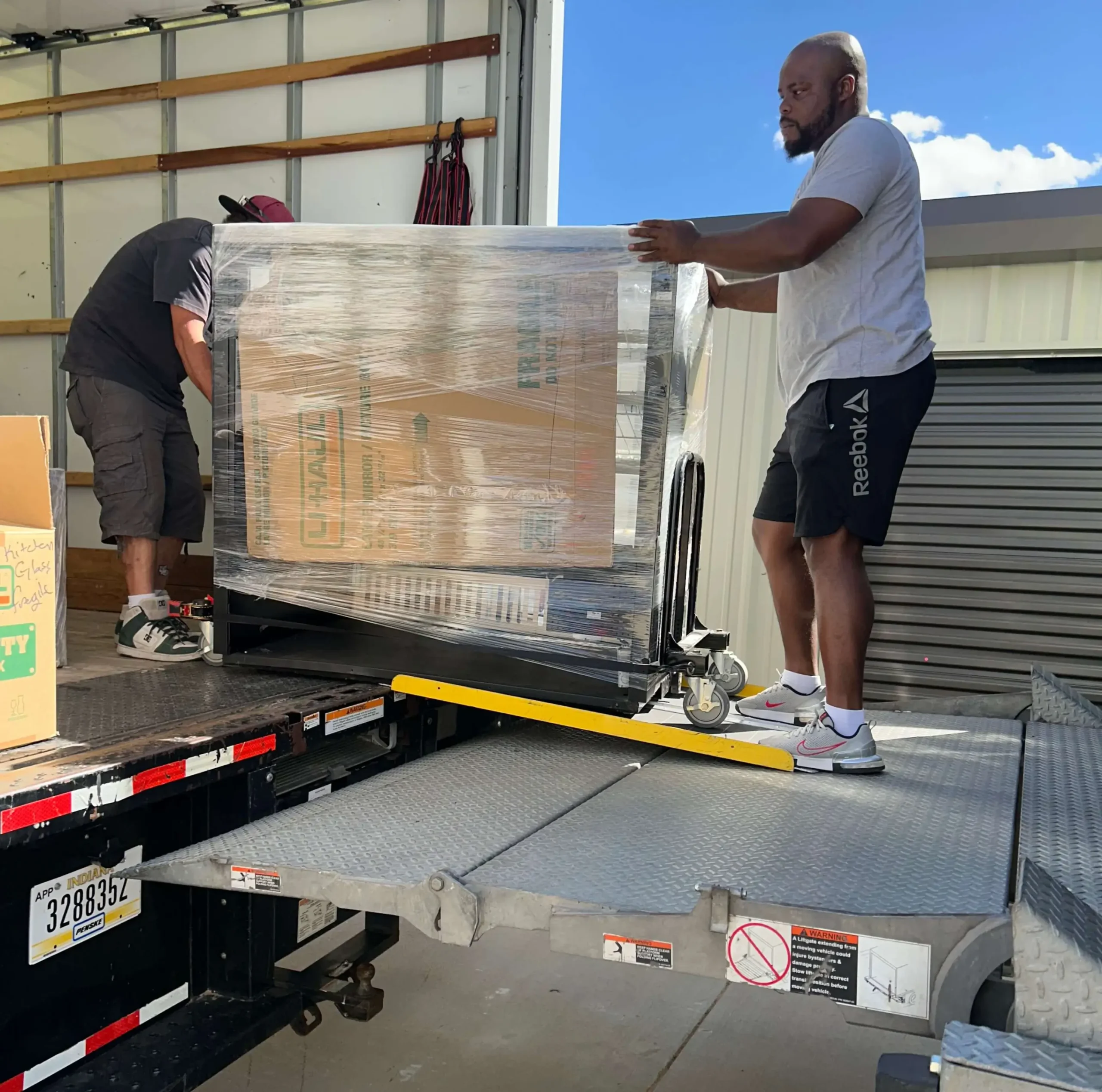 image of movers loading the truck