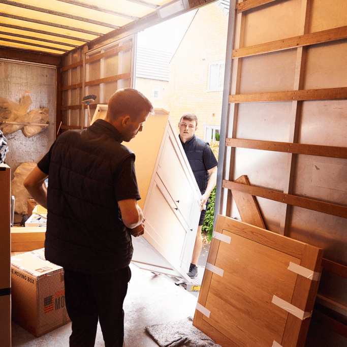 moving out cabinet with boxes